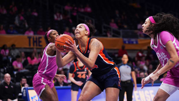 London Clarkson shoots the ball during the Virginia women's basketball game at Pittsburgh.